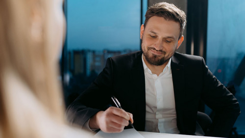 interview of a male and a female in the office. interview in the office. conversation of colleagues