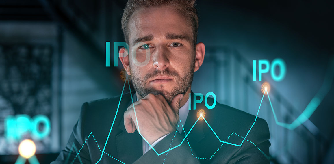 Portrait of handsome businessman in formal suit thinking how to optimize IPO strategy. Financial chart hologram over modern office background. Go public concept. Hand on chin.