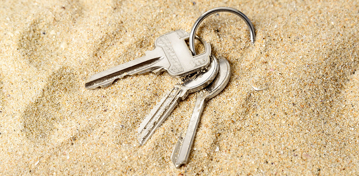 Schlüsselbund in Sand