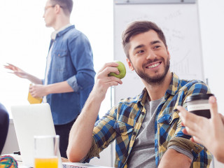 Skillful four colleagues are resting in office