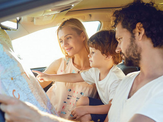 The family travels in the car in the summer