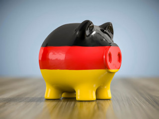 fat piggy bank in german colors