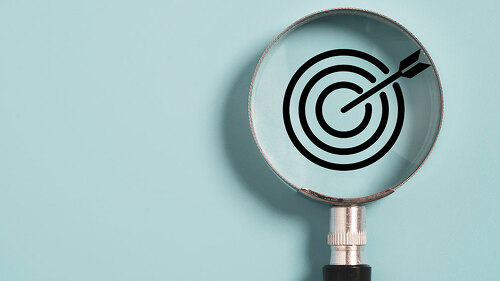 Target board inside of magnifier glass for focus business object