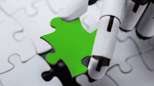 Robot Holding Green Jigsaw Puzzle