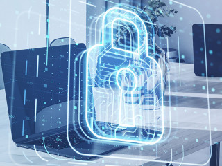 Close up of laptop with glowing padlock hologram on blurry background. Safety and security concept. Double exposure.