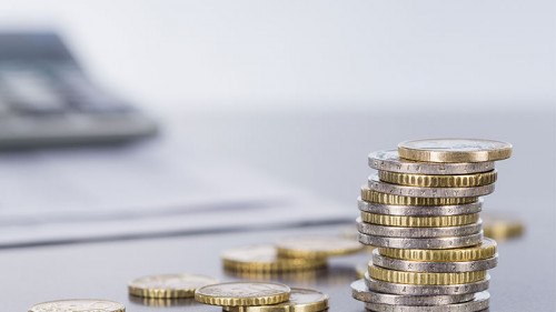 Taschenrechner-Muenzen-138465352-FO-v-poth