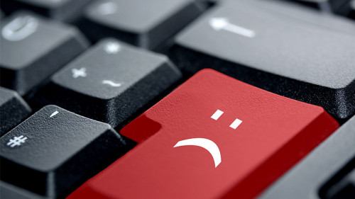 Enter-Taste-trauriger-Smiley-29668428-FO-IckeT