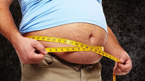 Mann-Maßband-Uebergewicht-78669986-FO-Kurhan