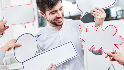 Anzugtraeger-Sprechblasen-147189774-FO-Robert-Kneschke