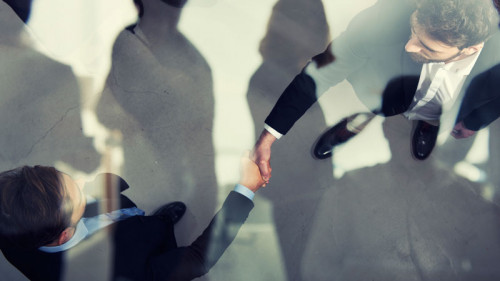 Handshaking Business-Fotolia-222943646-alphaspirit.jpg