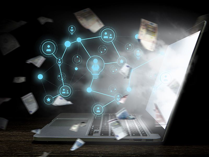 Laptop-Geldscheine-Netzwerk-174364822-FO-Sergey-Nivens
