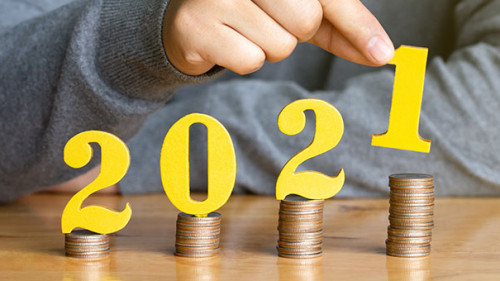 Mann-Muenzstapel-2021-286971398-AS-Pcess609