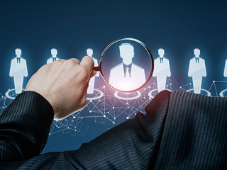 Anzugtraeger-Lupe-255206177-AS-natali-mis