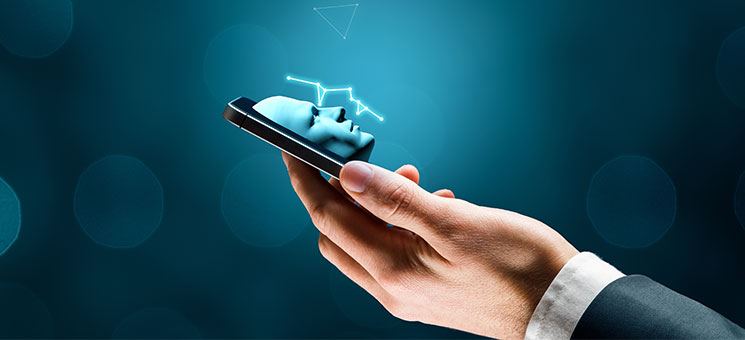 Hand-Smartphone-Gesicht-247508340-AS-jirsak