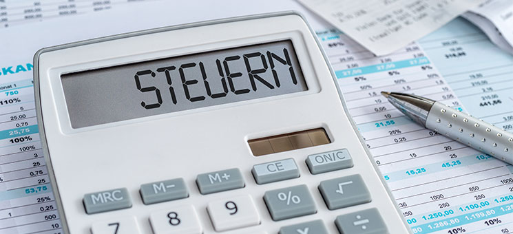 Steuern-Taschenrechner-Stift-268989629-AS-Zerbor