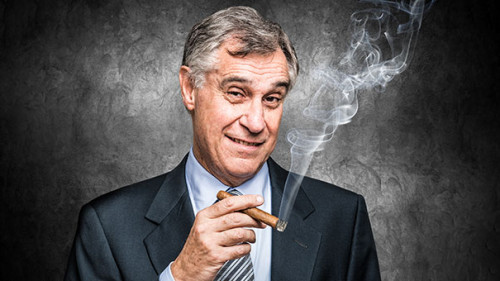 Anzugtraeger-Zigarre-164388667-AS-Minerva-Studio