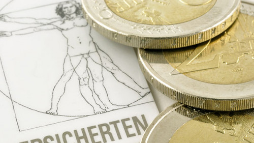 Krankenkassenkarte-Muenzen-20350366-AS-Setareh