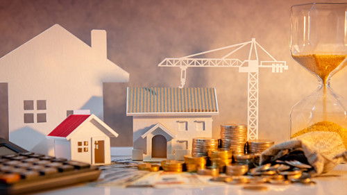 Haus-Kran-Taschenrechner-Muenzen-271276921-AS-zephyr-p