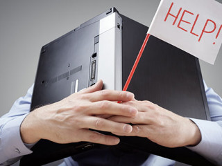 Anzugtraeger-Laptop-Help-141874763-AS-Brian-Jackson