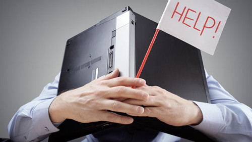 Anzugtraeger-Laptop-Help-141874763-AS-Brian-Jackson