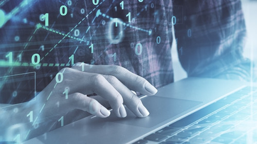 Hand-Laptop-Binaer-Code-233932062-AS-denisismagilov