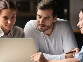 Female insurance mortgage broker consult couple showing online presentation