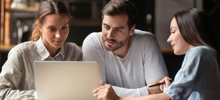 Female insurance mortgage broker consult couple showing online presentation