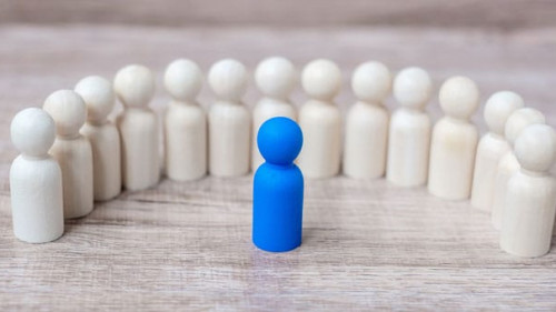 blue leader businessman with crowd of wooden men. leadership, bu
