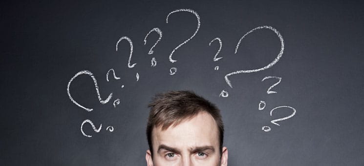 businessman with question marks