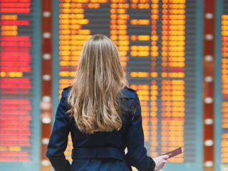 Young female traveler in international airport