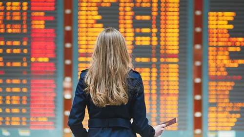 Young female traveler in international airport
