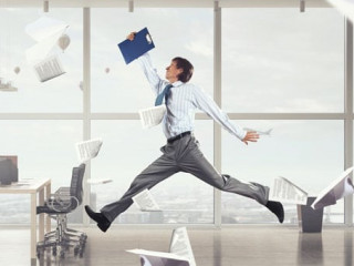 Jumping businessman in office . Mixed media