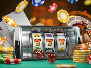 Online casino. Smartphone or mobile phone, slot machine, dice, c