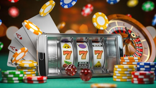 Online casino. Smartphone or mobile phone, slot machine, dice, c