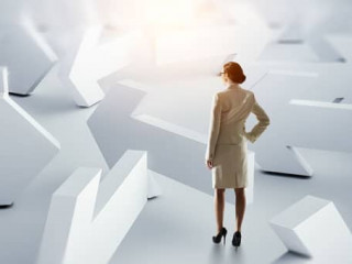 Young businesswoman and lots of arrows with different directions. Mixed media