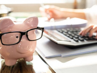 Pink Piggy Bank Over Office Desk
