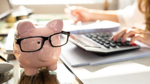 Pink Piggy Bank Over Office Desk