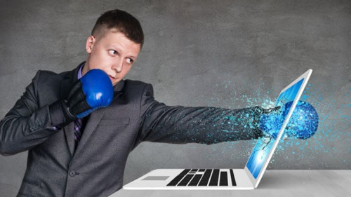 Businessman is boxing