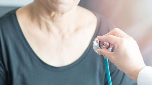 Doctor hand with stethoscope check up elderly woman people. Old