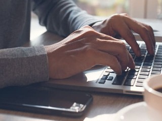 Business man working on laptop computer