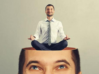 man looking up at calm yoga man