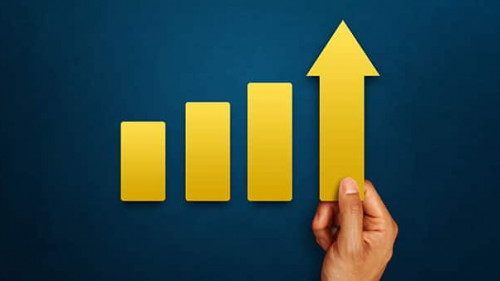 Businessman is touching arrows pointing up with graph as a symbo