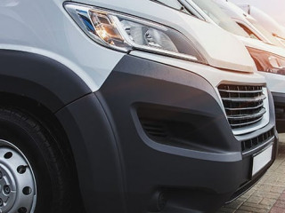 minibuses and vans outside