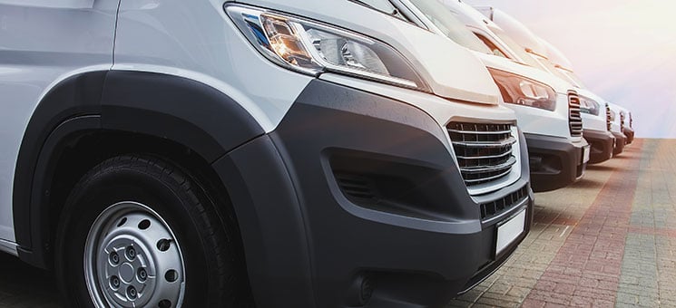 minibuses and vans outside