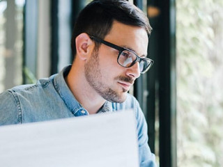 Serious pensive thoughtful focused young casual business account
