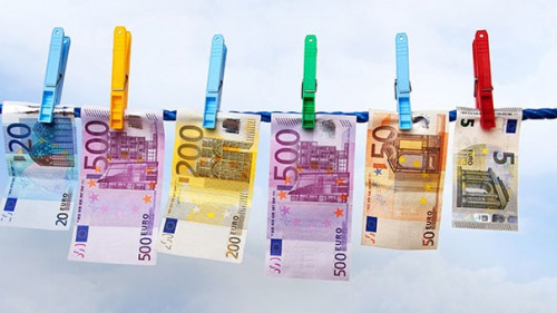 Banknotes hanging on a clothesline