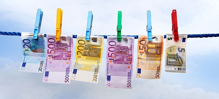 Banknotes hanging on a clothesline
