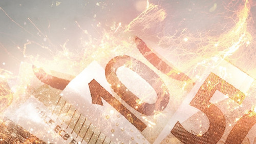 Euroscheine in Einkaufswagen stehen in Flammen