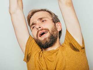 satisfaction and stretching hands man