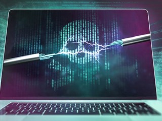 Laptop-Totenschaedel-245125119-AS-m-mphoto